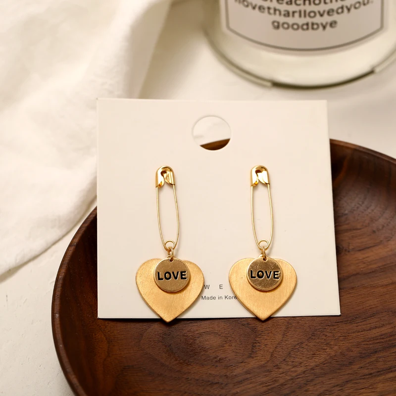 IF ME Cute Fashion Love Heart Shaped Gold Metal Drop Earrings for Women Girls Vintage Small Statement Dangle Earring Jewelry New
IF ME Cute Fashion Love Heart Shaped Gold Metal Drop Earrings for Women Girls Vintage Small Statement Dangle Earring Jewelry New