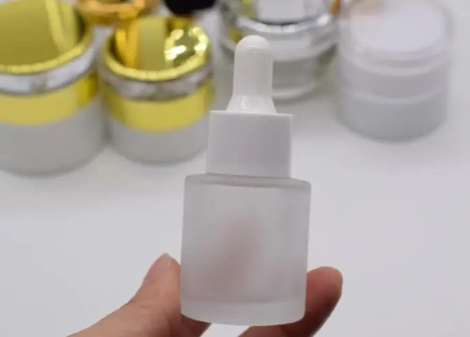 100pcs 20ML frost OR clear empty glass dropper bottle with white or black dropper cap, 20ml glass dropper bottles
100pcs 20ML frost OR clear empty glass dropper bottle with white or black dropper cap, 20ml glass dropper bottles