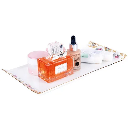 Cosmetic storage trays Wedding kettle tea set Tea accessories home creative decoration ornaments jewelry ceramic tray
Cosmetic storage trays Wedding kettle tea set Tea accessories home creative decoration ornaments jewelry ceramic tray