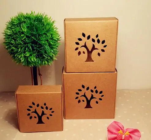 10.5*10.5*4cm Kraft paper gift packaging box kraft paper box with tree hollow Pattern window small kraft soap packing box
10.5*10.5*4cm Kraft paper gift packaging box kraft paper box with tree hollow Pattern window small kraft soap packing box