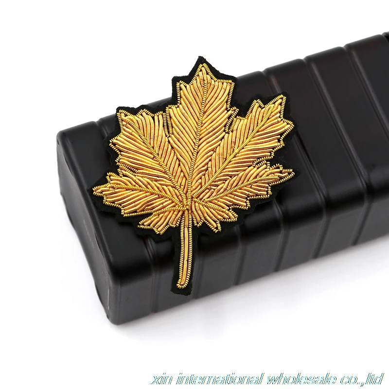 New fashion design metal wire military badge Handmade embroidery chapas Maple leaves badge Clothes bag badge pin
New fashion design metal wire military badge Handmade embroidery chapas Maple leaves badge Clothes bag badge pin