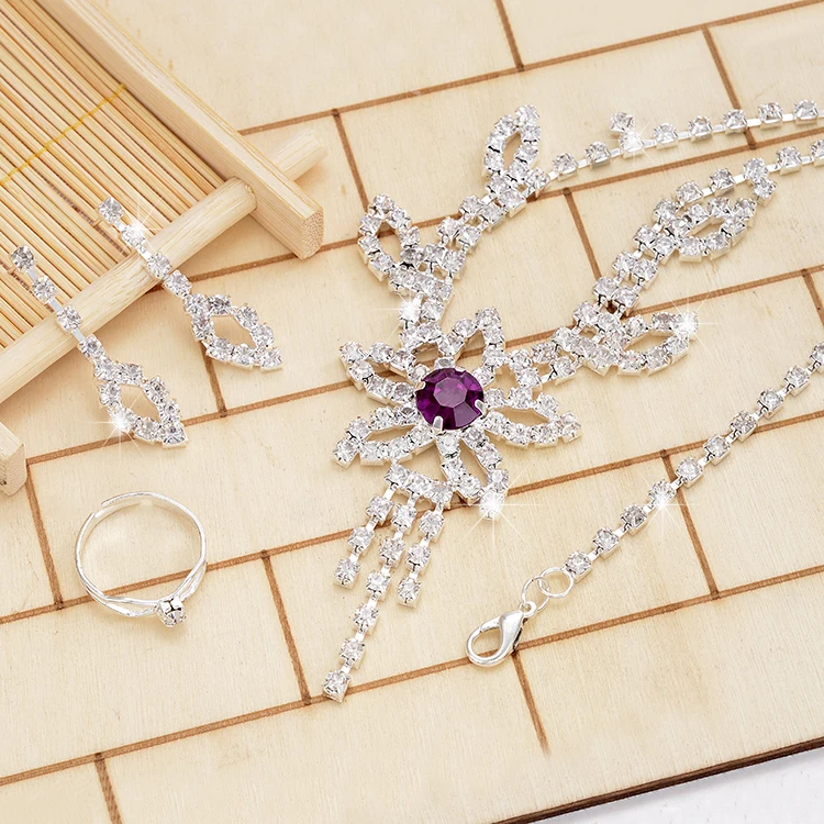 Bling Engagement Jewelry Sets 4pcs Crystal Purple Rhinestone Flower Necklace With Earrings Bracelet Ring Set Wholesale
Bling Engagement Jewelry Sets 4pcs Crystal Purple Rhinestone Flower Necklace With Earrings Bracelet Ring Set Wholesale
