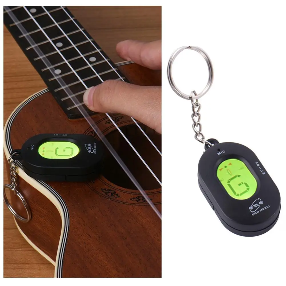 Dragonpad Mini Guitar Tuner Key Ring Style LCD Display Chromatic Tuner Automatic for General Musical Instrument
Dragonpad Mini Guitar Tuner Key Ring Style LCD Display Chromatic Tuner Automatic for General Musical Instrument