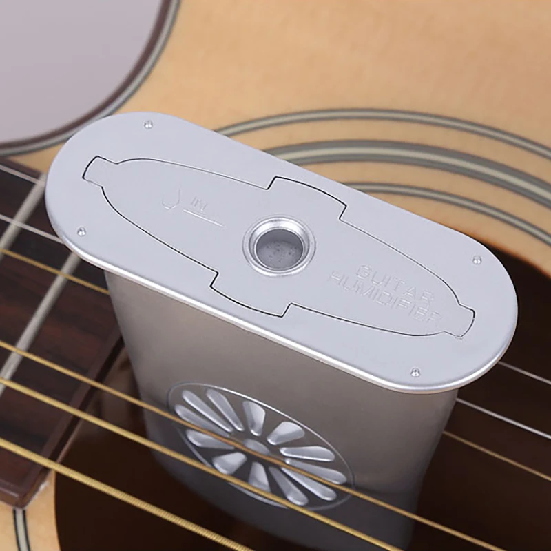Portable New Plastic Mini Guitar Sound Holes Humidifier Diffuser Moisture Reservoir Useful Anti-drying Humidity Device Supplies
Portable New Plastic Mini Guitar Sound Holes Humidifier Diffuser Moisture Reservoir Useful Anti-drying Humidity Device Supplies