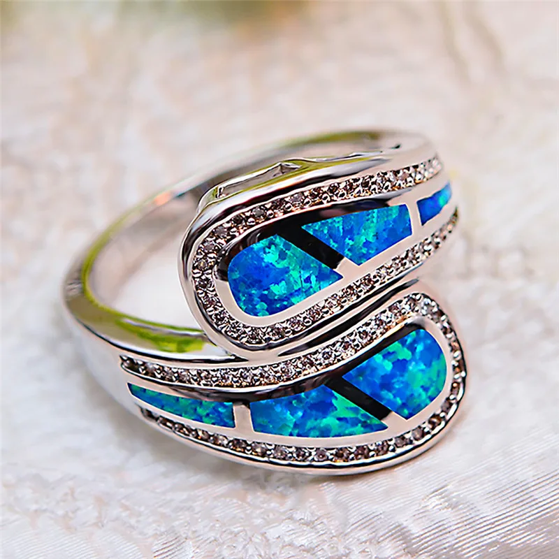 Boho Female White Blue Fire Opal Ring Unique 925 Sterling Silver Wedding Band Ring Promise Engagement Rings For Women
Boho Female White Blue Fire Opal Ring Unique 925 Sterling Silver Wedding Band Ring Promise Engagement Rings For Women