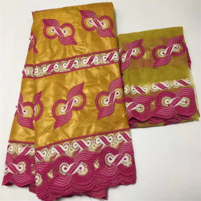 Nigerian lace bazin riche getzner guinea brocade fabric fashion handcut bazin brocade with net blouse matching
Nigerian lace bazin riche getzner guinea brocade fabric fashion handcut bazin brocade with net blouse matching