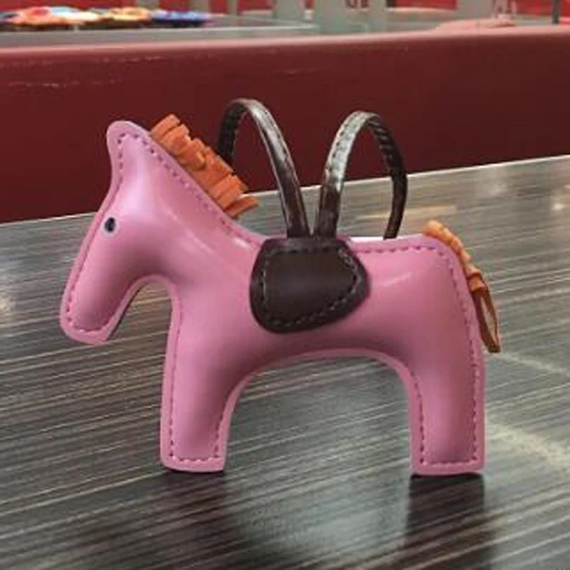 Luxury PU Leather Cute Horse Pendant Manual Small Tassel Hanging Ornament Women Shoulder Bags Charms Keychain Accessories R247
Luxury PU Leather Cute Horse Pendant Manual Small Tassel Hanging Ornament Women Shoulder Bags Charms Keychain Accessories R247