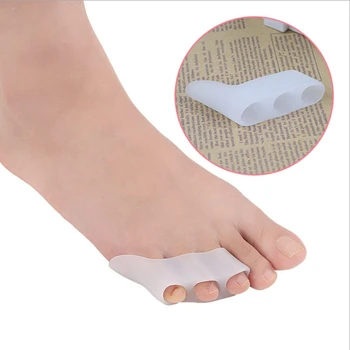 1 Pair Silicone Gel Foot Fingers Two Hole Toe Separator Thumb Valgus Protector Bunion Adjuster Bunionette Pads
1 Pair Silicone Gel Foot Fingers Two Hole Toe Separator Thumb Valgus Protector Bunion Adjuster Bunionette Pads