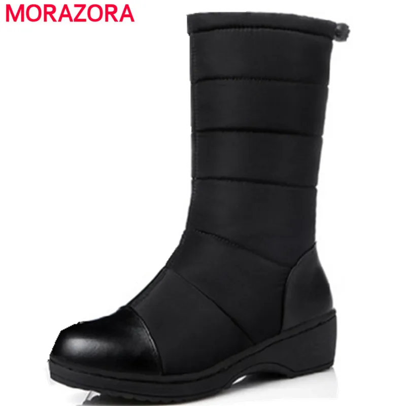 Image MORAZORA Russia women boots Big size 35 44 keep warm snow boots platform winter knee high boots fashion shoes solid white color