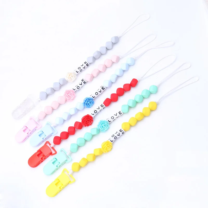 LOVE Style Baby Pacifier Toddler Baby Infant Soother Plastic Safety Pacifier Clips Holders Chain Leashes Cases Safe Material 
LOVE Style Baby Pacifier Toddler Baby Infant Soother Plastic Safety Pacifier Clips Holders Chain Leashes Cases Safe Material