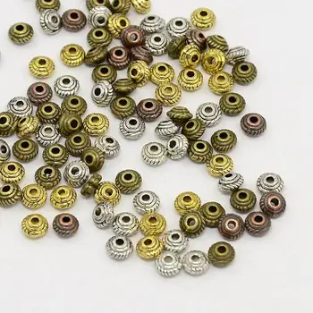 Mixed Color Tibetan Silver Bicone Bead Spacers, Cadmium Free & Nickel Free & Lead Free, 5x3mm, Hole: 1.5mm; about 1250pcs/200g
Mixed Color Tibetan Silver Bicone Bead Spacers, Cadmium Free & Nickel Free & Lead Free, 5x3mm, Hole: 1.5mm; about 1250pcs/200g