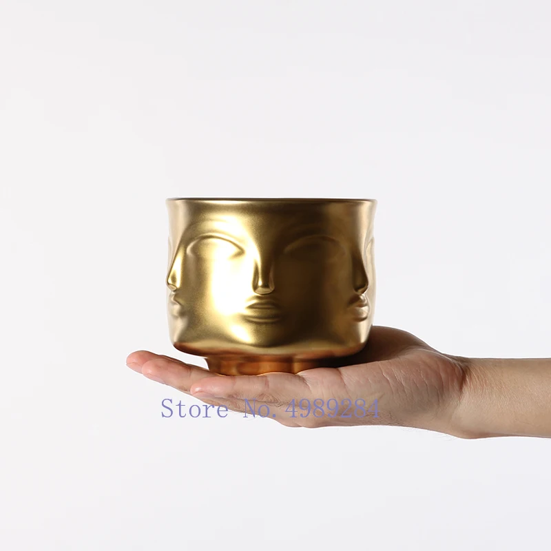 Nordic Creative ceramics abstract Human head human face flower pot vase Multi-faceted Gold vase Home modern decoration
Nordic Creative ceramics abstract Human head human face flower pot vase Multi-faceted Gold vase Home modern decoration