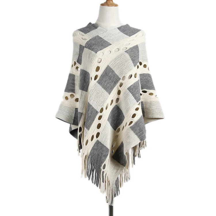 Square lattice hollow irregular tassel pullover women loose large size European and American cloak shawl sweater 69151
Square lattice hollow irregular tassel pullover women loose large size European and American cloak shawl sweater 69151