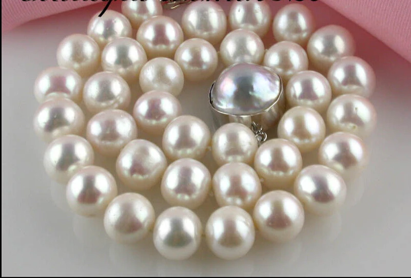 FREE SHIPPING ******* z1702 18" 13mm round white fw pearl necklace Mabe silver clasp
FREE SHIPPING ******* z1702 18" 13mm round white fw pearl necklace Mabe silver clasp
