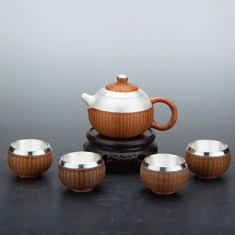 New Pure Silver Teapot Bamboo Knitted Insulation 999 Silver Teapot Tea Ceremony Large Capacity Home Pure Silver Tea Set
New Pure Silver Teapot Bamboo Knitted Insulation 999 Silver Teapot Tea Ceremony Large Capacity Home Pure Silver Tea Set