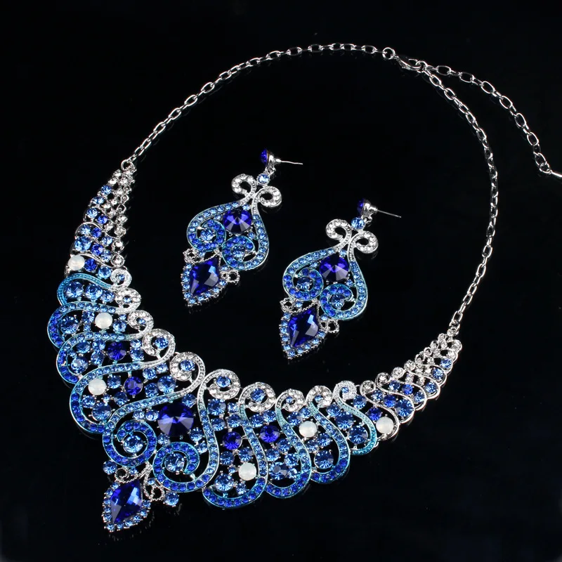 Vintage Bridal Water Drop Rhinestone Pendant Necklace Earrings Flower Wedding Jewelry Set Blue Crystal Dress Accessories Gift
Vintage Bridal Water Drop Rhinestone Pendant Necklace Earrings Flower Wedding Jewelry Set Blue Crystal Dress Accessories Gift