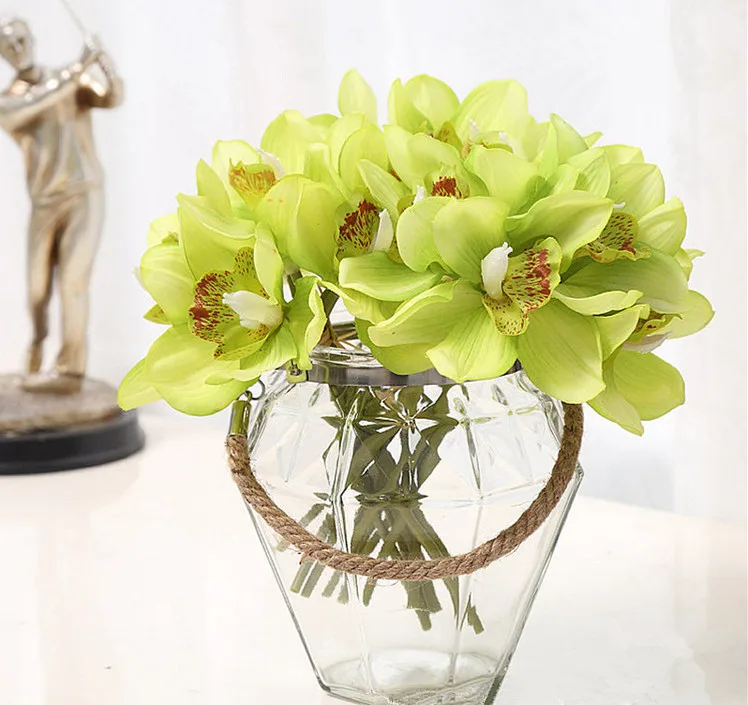Real Touch cymbidium 6 heads Short shoot table decoration flower DIY wedding bride hand flowers home decor artificial orchid
Real Touch cymbidium 6 heads Short shoot table decoration flower DIY wedding bride hand flowers home decor artificial orchid