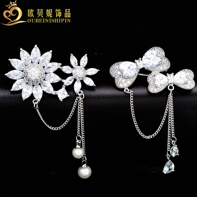 OBN Luxury Silver Micro Paved CZ CC Bow Flower Brooch Pin Chain Romantic Broaches Jewelry For Women Gift
OBN Luxury Silver Micro Paved CZ CC Bow Flower Brooch Pin Chain Romantic Broaches Jewelry For Women Gift