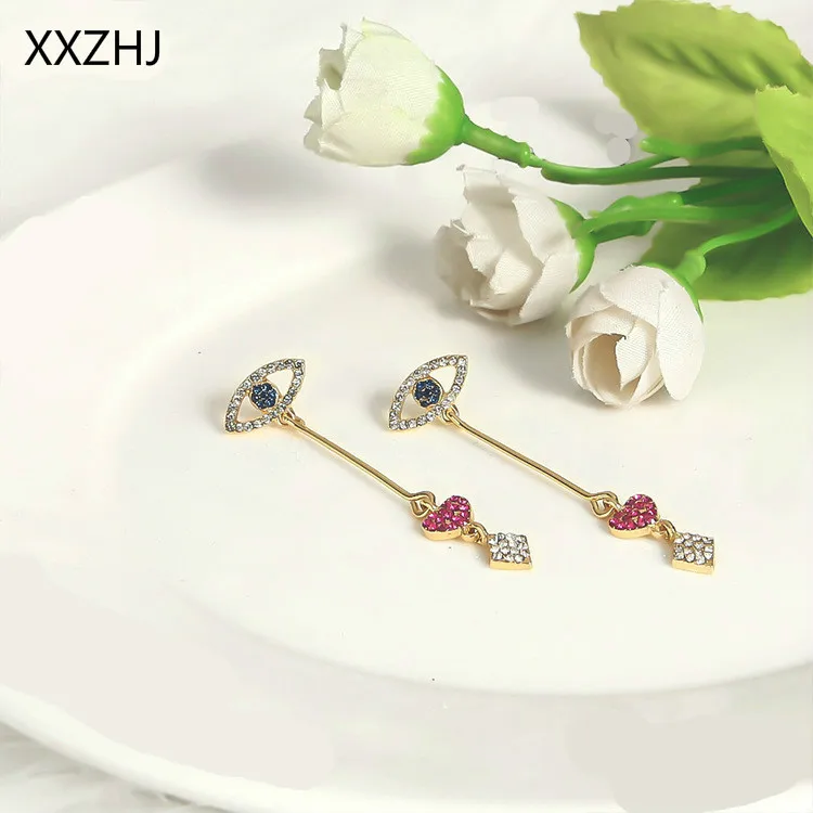 Free Shipping! 2018 Fashion New Earrings Temperament Cute Crystal Heart-shaped Long Love Tassel Ladies Earrings Gift Wholesale 
Free Shipping! 2018 Fashion New Earrings Temperament Cute Crystal Heart-shaped Long Love Tassel Ladies Earrings Gift Wholesale