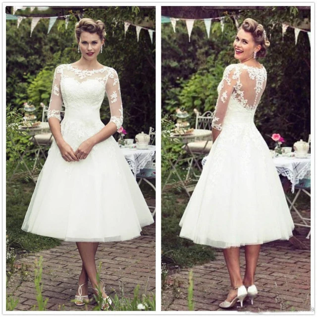 Vintage 50's Style Short Lace Wedding Dresses Half Sleeves Tulle Lace Applique Tea Length Bridal Wedding Gowns with Buttons
Vintage 50's Style Short Lace Wedding Dresses Half Sleeves Tulle Lace Applique Tea Length Bridal Wedding Gowns with Buttons