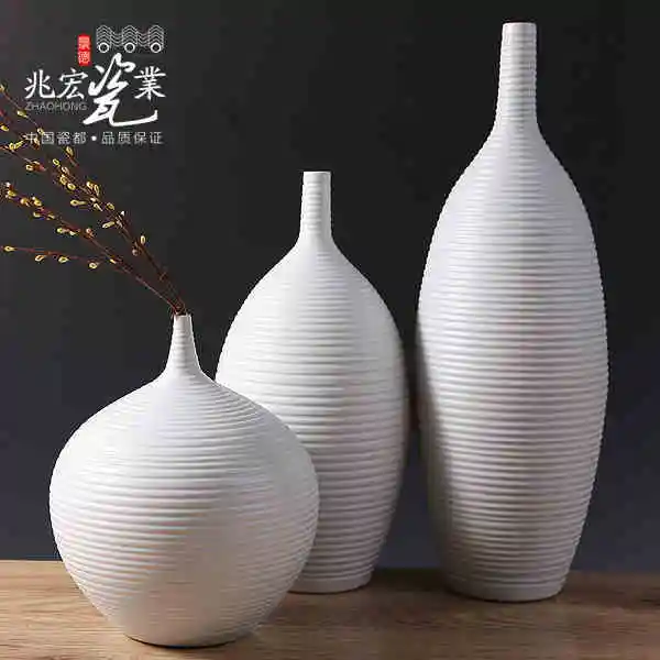 Siu Hong ceramics modern minimalist living room decoration fashion jewelry crafts white vase Home Furnishing
Siu Hong ceramics modern minimalist living room decoration fashion jewelry crafts white vase Home Furnishing