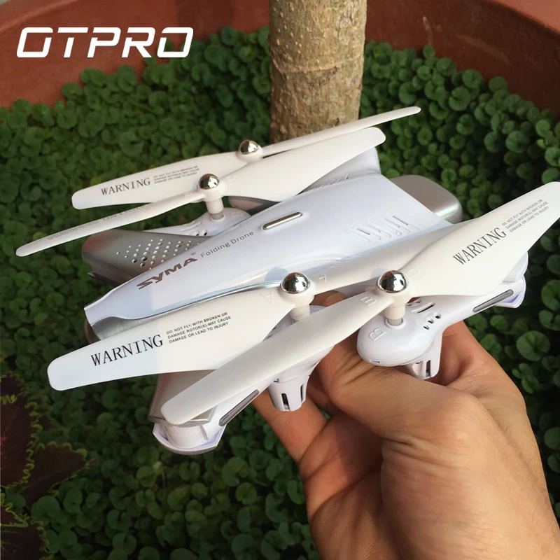 OTPRO WIFI FPV RC Drone With Camera HD 2MP Wide Angle Foldable Mini Drone Headless Mode G-sensor RC Quadcopter Helicopter Z3
OTPRO WIFI FPV RC Drone With Camera HD 2MP Wide Angle Foldable Mini Drone Headless Mode G-sensor RC Quadcopter Helicopter Z3