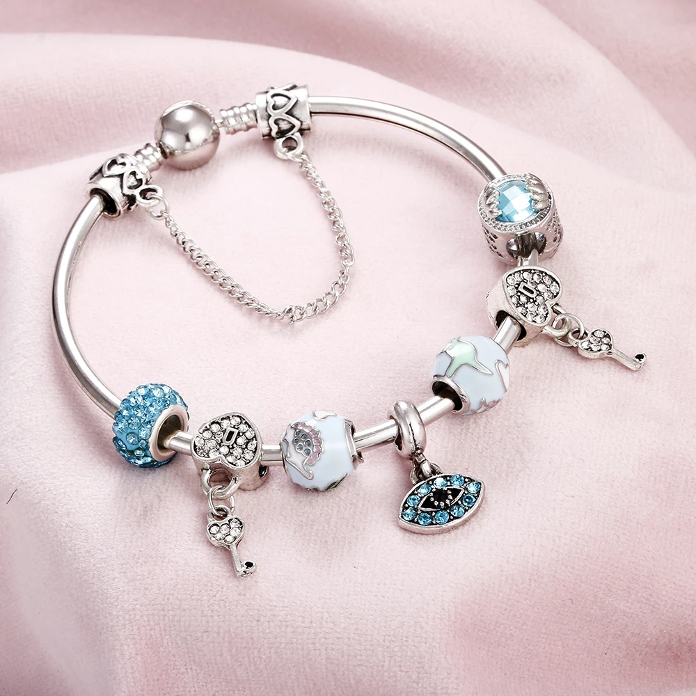 Punk Women Bracelet Pour Charm Blue Evil Eyes Heart Key Crystal Beads Ladies Chain Bracelets Silver Bangles Jewelry Femme Gift
Punk Women Bracelet Pour Charm Blue Evil Eyes Heart Key Crystal Beads Ladies Chain Bracelets Silver Bangles Jewelry Femme Gift