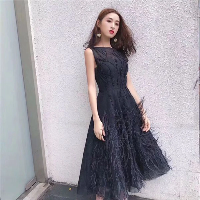 Seiwnibu Luxury Designer Summer Big Swing Party Dress Women Sleeveless Black Beading Tassel Feather Dress Runway Tank Midi Dress
Seiwnibu Luxury Designer Summer Big Swing Party Dress Women Sleeveless Black Beading Tassel Feather Dress Runway Tank Midi Dress