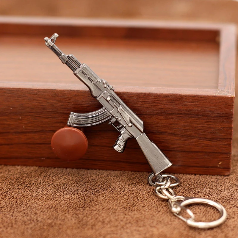 Creative Popular Games Mini AK47 Rifle Model Keychain Guns Weapon Metal Key Chain For Unisex Men Cool Souvenir Chain Car Keyring
Creative Popular Games Mini AK47 Rifle Model Keychain Guns Weapon Metal Key Chain For Unisex Men Cool Souvenir Chain Car Keyring
