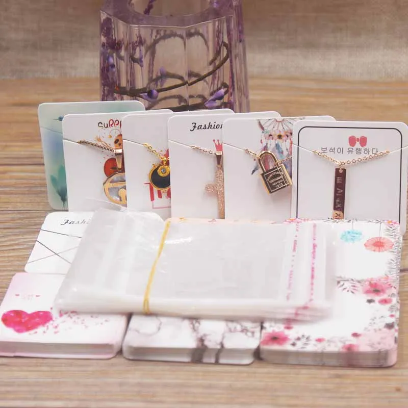 24designs Fashion Jewelry Display Necklace charms package card heart/ flower /marble style pendant displaycard100pc+100oppbag
24designs Fashion Jewelry Display Necklace charms package card heart/ flower /marble style pendant displaycard100pc+100oppbag