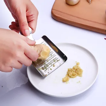 Stainless Steel Ginger Grater Seasoning Grinder Garlic Slicer Cutter Multi-Function Tools Silver Color Planer Kitchen Accessory
Stainless Steel Ginger Grater Seasoning Grinder Garlic Slicer Cutter Multi-Function Tools Silver Color Planer Kitchen Accessory