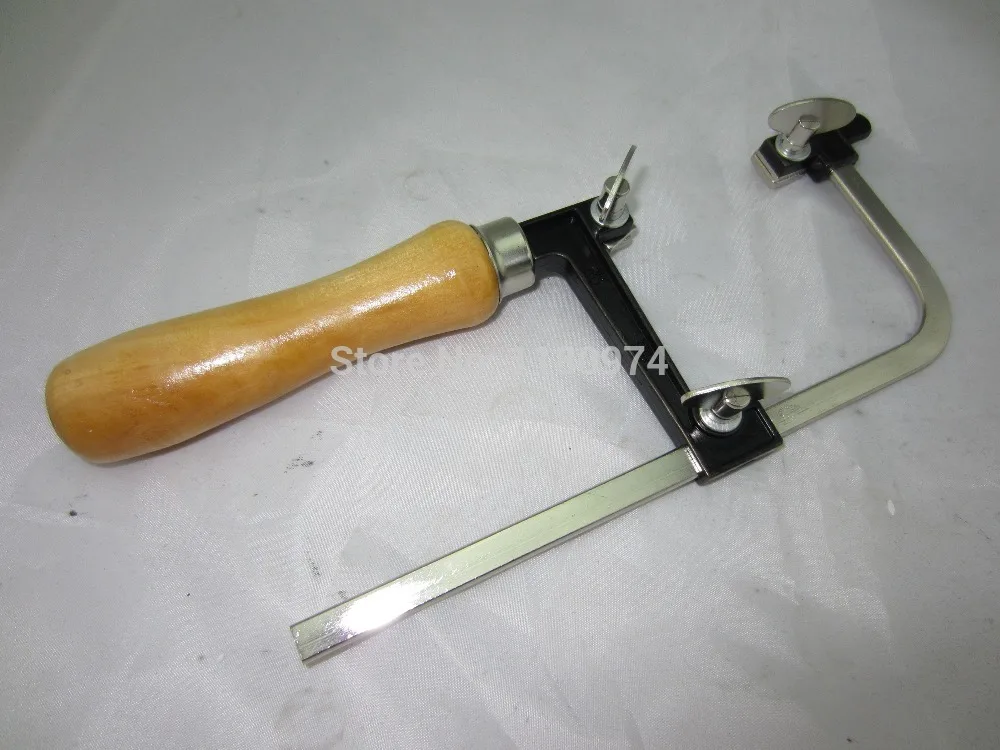 jewelry gold silver metal diamond gemstone cutting frame adjustable white wooden handle frame,saw bow, saw frame
jewelry gold silver metal diamond gemstone cutting frame adjustable white wooden handle frame,saw bow, saw frame