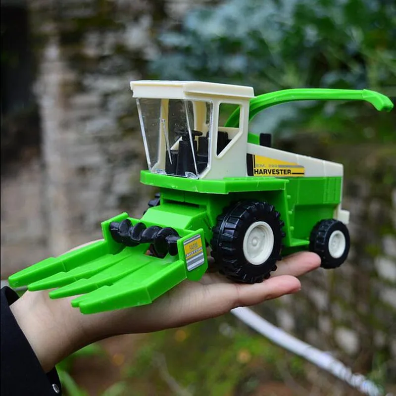 21*7*10CM Large Harvester tractor Cars Engineering vehicles transport farm Harvesters Children's toy car green color
21*7*10CM Large Harvester tractor Cars Engineering vehicles transport farm Harvesters Children's toy car green color