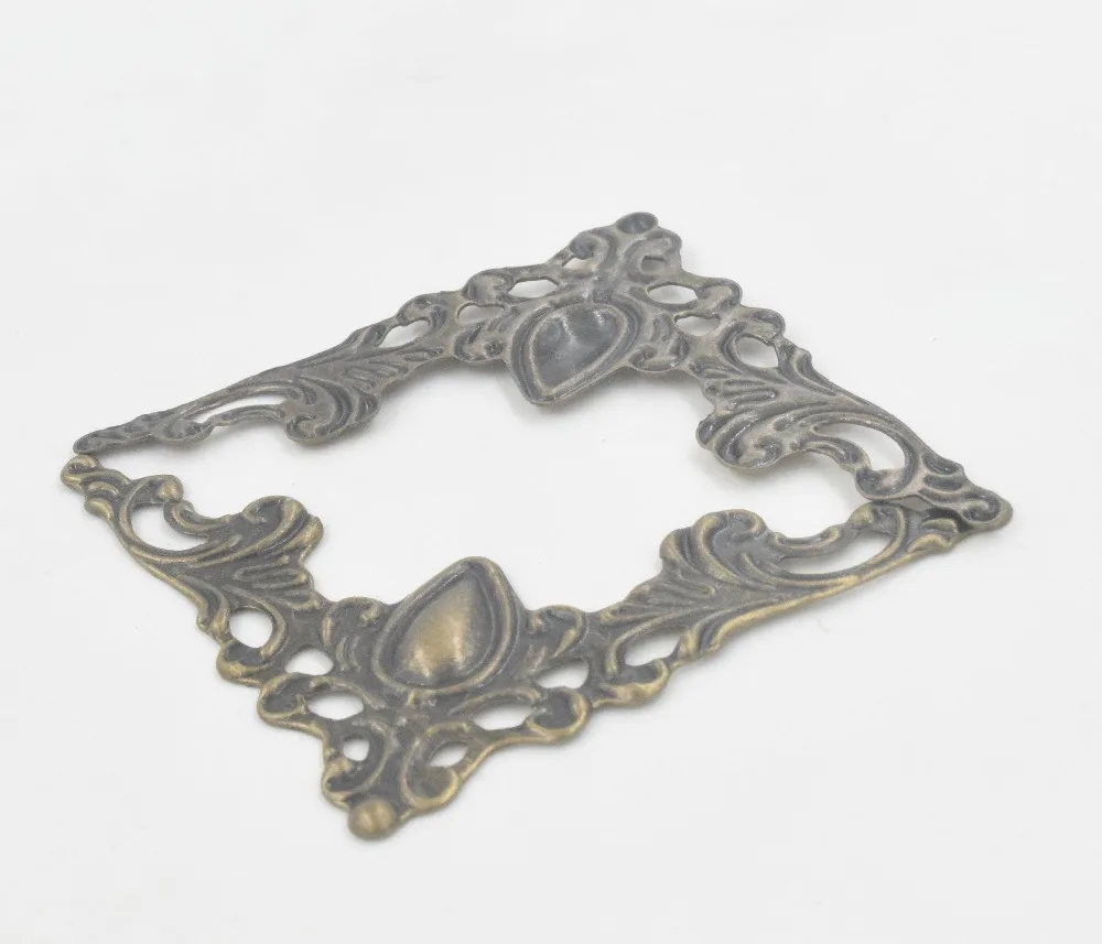 Bronze Filigree Triangle Flower Wraps Cabochon,Ancient Heart Corner,Flatback Metal Embellishments Scrapbooking,42mm,100Pcs
Bronze Filigree Triangle Flower Wraps Cabochon,Ancient Heart Corner,Flatback Metal Embellishments Scrapbooking,42mm,100Pcs
