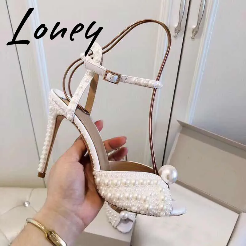 Loney New Quality Genuie Leather Elegant Pearl Beads Summer Sandals Open Toe Buckle Strap HIgh Heel Sandals Wedding Sandals Shoe
Loney New Quality Genuie Leather Elegant Pearl Beads Summer Sandals Open Toe Buckle Strap HIgh Heel Sandals Wedding Sandals Shoe