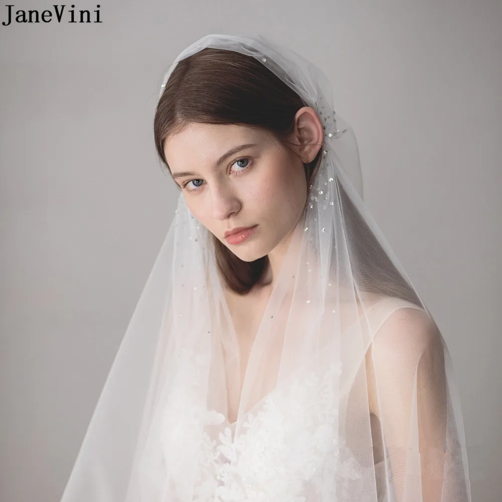 JaneVini 2019 Vintage One Layer White Bridal Veils Cut Edge Fingertip Length Veil Beaded Soft Tulle Brides Wedding Accessories
JaneVini 2019 Vintage One Layer White Bridal Veils Cut Edge Fingertip Length Veil Beaded Soft Tulle Brides Wedding Accessories