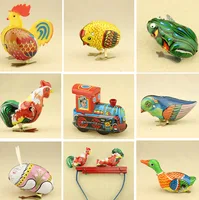 Kids Classic Toy Tin Wind Up Clockwork Toys Jumping Iron Frog Rabbit Cock Toy New Action Figures Toy For Children image