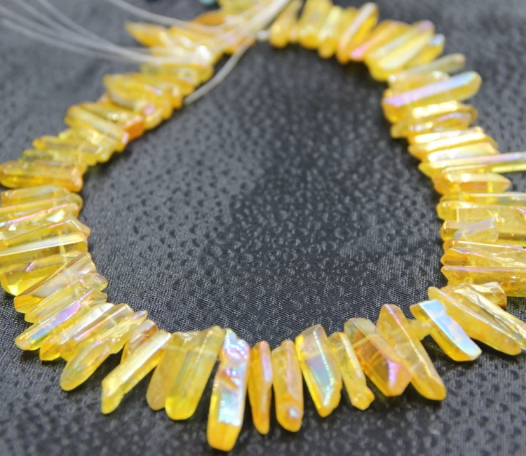 Approx 70pcs/strand Champagne Crystal AB Quartz Point Pendant Druzy Crystal Top Drilled Stick Gem Stone Beads Crystal Necklace
Approx 70pcs/strand Champagne Crystal AB Quartz Point Pendant Druzy Crystal Top Drilled Stick Gem Stone Beads Crystal Necklace