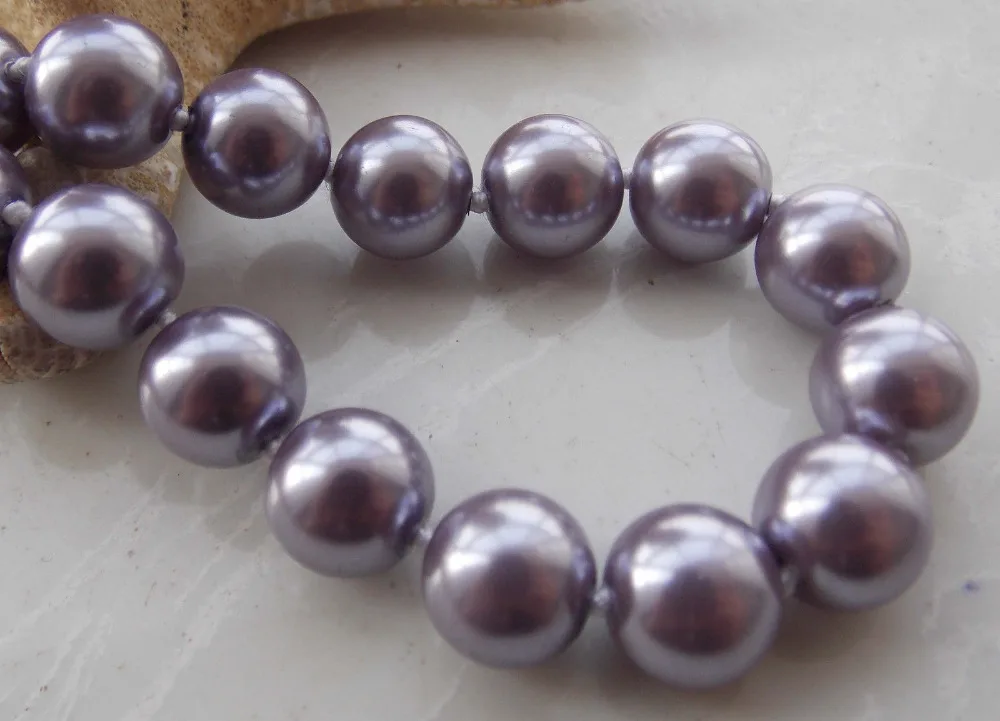 Free Shipping >>>>>AAA 10mm Purple South Sea Shell Pearl Round Beads Necklace 18'' F-22
Free Shipping >>>>>AAA 10mm Purple South Sea Shell Pearl Round Beads Necklace 18'' F-22
