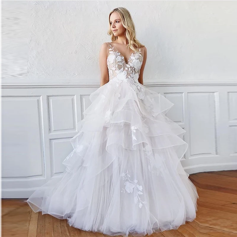 New Illusion Vestido De Noiva Deep V-neck Sexy Backless Sleeveless Tiered Tulle Skirt Bridal Gowns White Ivory Wedding Dresses
New Illusion Vestido De Noiva Deep V-neck Sexy Backless Sleeveless Tiered Tulle Skirt Bridal Gowns White Ivory Wedding Dresses