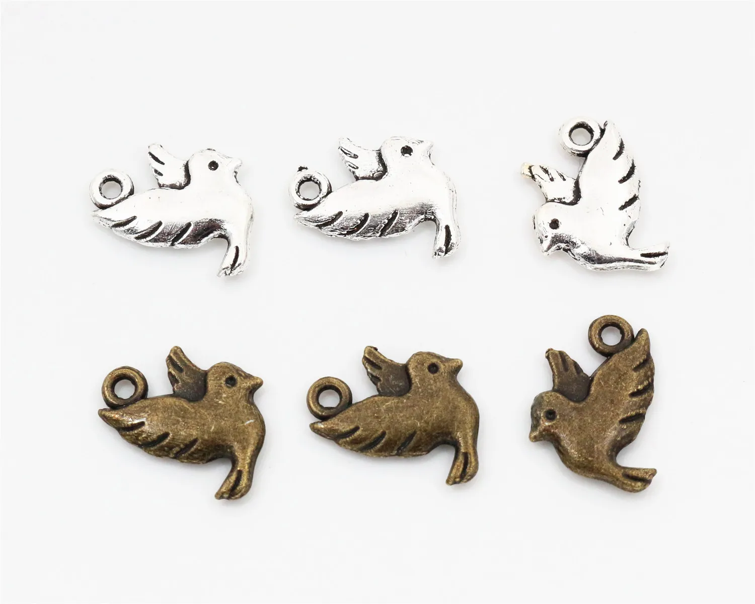 14x10mm 30pcs Antique Silver and Bronze Plated Bird Handmade Charms Pendant:DIY for bracelet necklace
14x10mm 30pcs Antique Silver and Bronze Plated Bird Handmade Charms Pendant:DIY for bracelet necklace