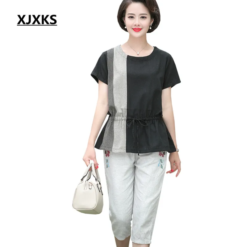 XJXKS 2019 summer new women's two-piece set plus size cotton linen short-sleeved T-shirt + elastic waist cropped trousers
XJXKS 2019 summer new women's two-piece set plus size cotton linen short-sleeved T-shirt + elastic waist cropped trousers