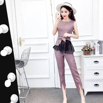 Women's 2018 Spring And Summer New Style Sleeveless Strap Slim Stitching Lace Clothes + Solid Color Wild Pants Set Temperament
Women's 2018 Spring And Summer New Style Sleeveless Strap Slim Stitching Lace Clothes + Solid Color Wild Pants Set Temperament