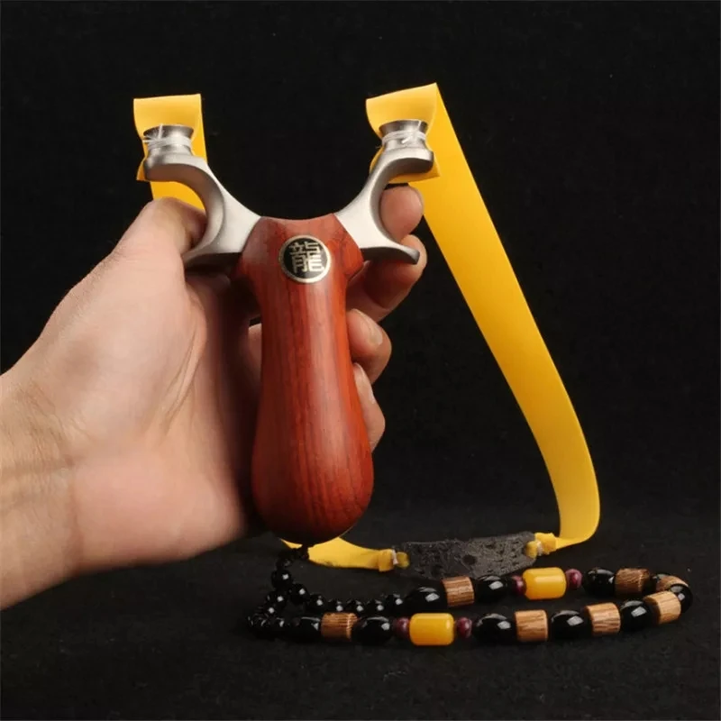 Hunting Slingshot Stainless Steel Catapult Patch Wood Handle Outdoor Sports Game Precision Sling shot With Powerful Rubber Band
Hunting Slingshot Stainless Steel Catapult Patch Wood Handle Outdoor Sports Game Precision Sling shot With Powerful Rubber Band