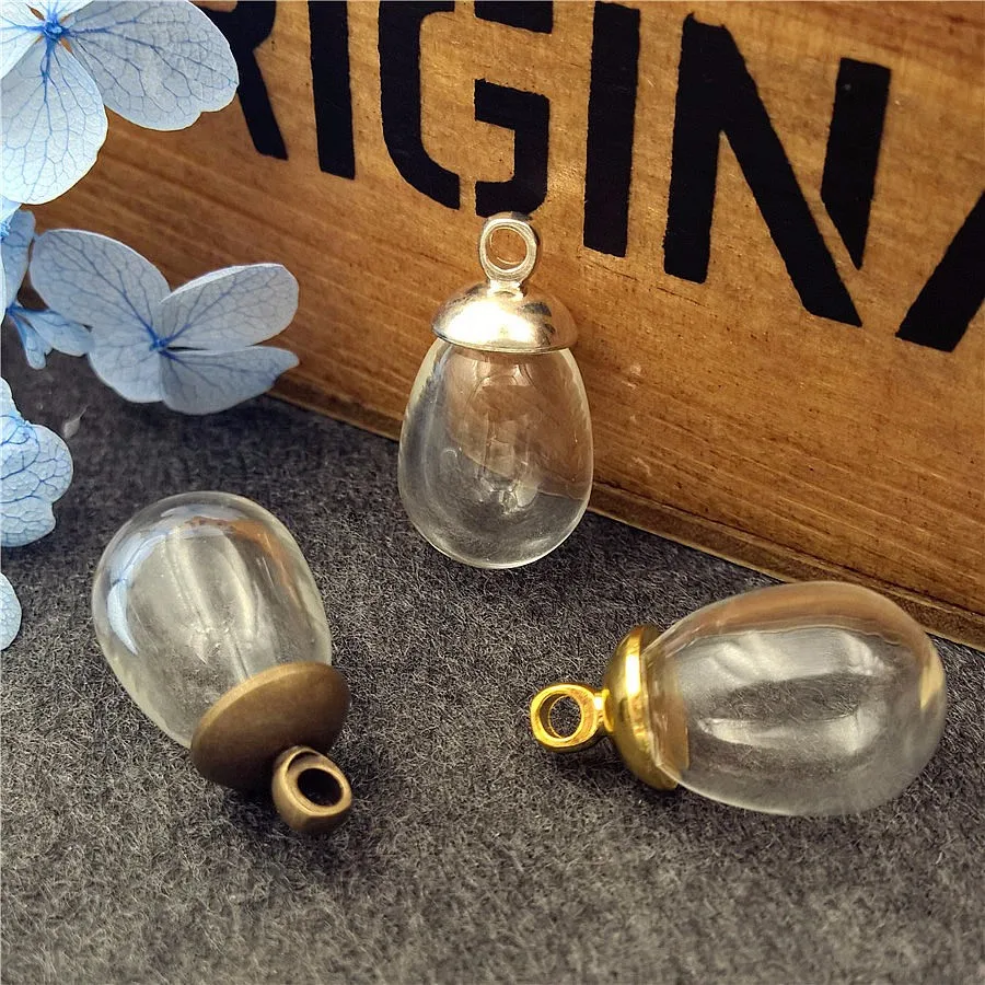 20sets 14.5x11mm water drop glass globe 3mm hole with 8mm beads cap set DIY jewelry findings glass vial pendant 
20sets 14.5x11mm water drop glass globe 3mm hole with 8mm beads cap set DIY jewelry findings glass vial pendant