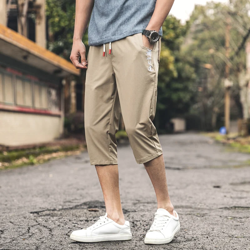 Solid Color Calf-Length Pants Embroidery Men's Pants Elastic Waist Large Size Black Gray Khaki Calf-Length Pants
Solid Color Calf-Length Pants Embroidery Men's Pants Elastic Waist Large Size Black Gray Khaki Calf-Length Pants