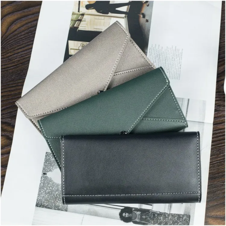 Women's wallet long large capacity multi-function clutch bag Korean version of the simple money clip buckle mobile phone bag
Women's wallet long large capacity multi-function clutch bag Korean version of the simple money clip buckle mobile phone bag