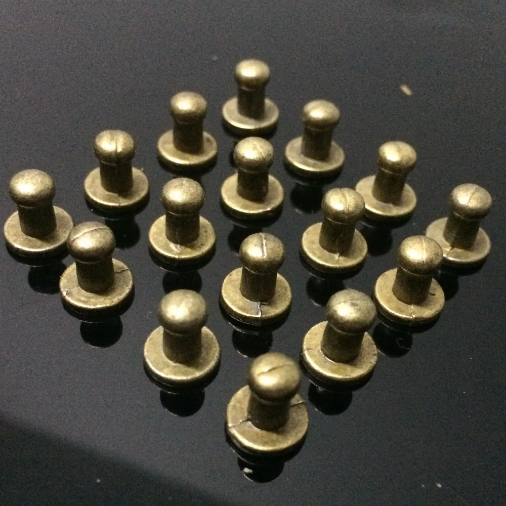New 100Pcs 8X5X8MM Bronze Round Bottom Screw Spikes Metal Studs Rivets Screwback Spots Cone Leather Craft Spikes Fit DIY Making
New 100Pcs 8X5X8MM Bronze Round Bottom Screw Spikes Metal Studs Rivets Screwback Spots Cone Leather Craft Spikes Fit DIY Making