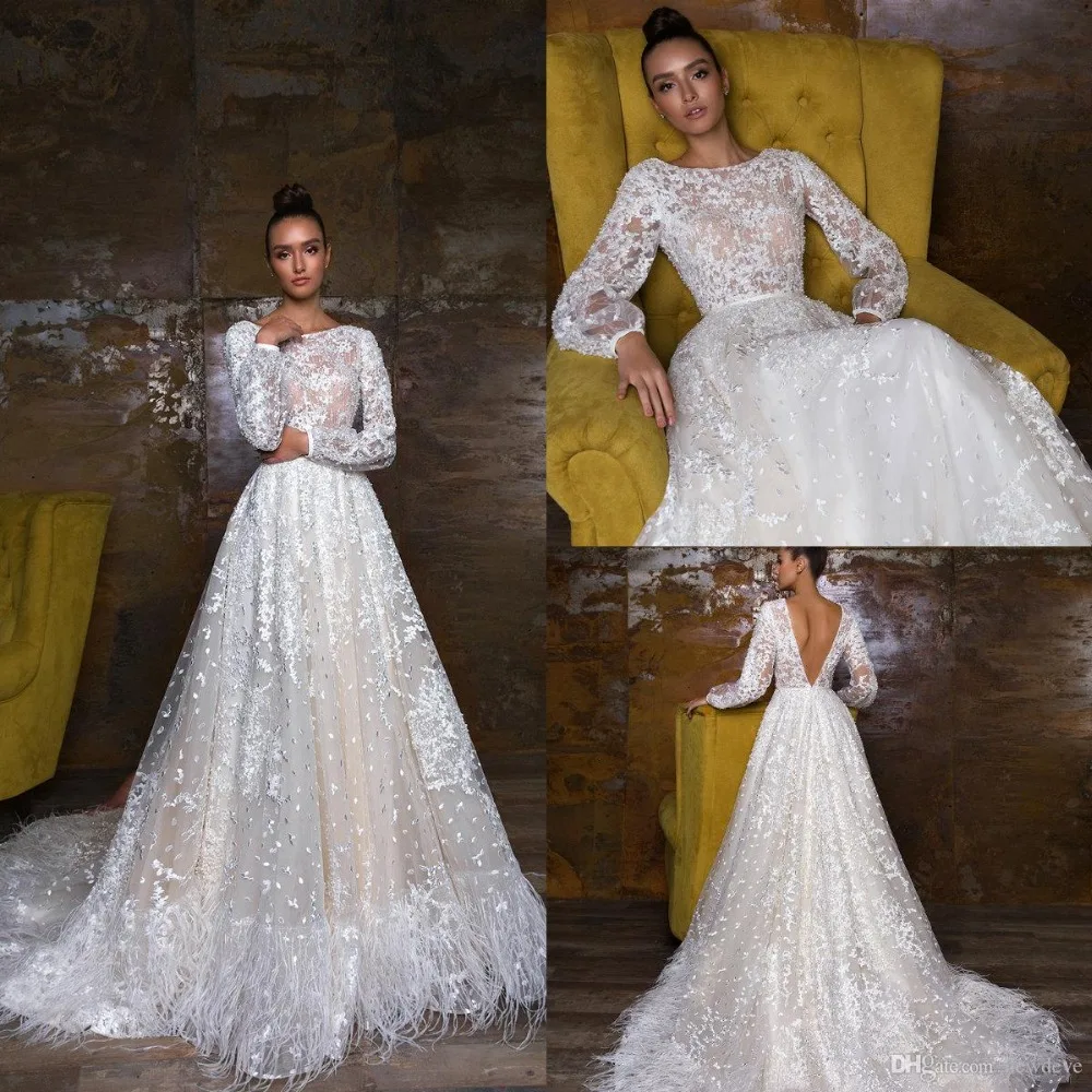 Crystal Design 2019 Wedding Dresses With Feather A Line Backless Sheer Neck Bridal Gowns Sweep Train Sleeveless Wedding Dress
Crystal Design 2019 Wedding Dresses With Feather A Line Backless Sheer Neck Bridal Gowns Sweep Train Sleeveless Wedding Dress