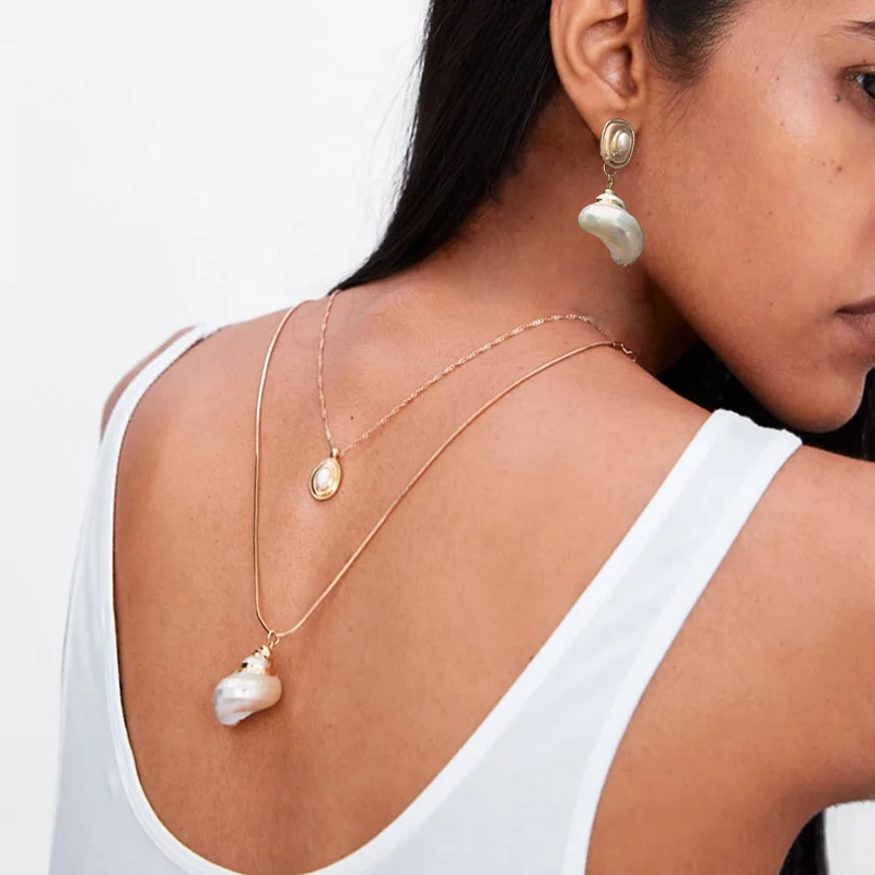 2019 new gold color shell conch pearl multi-layer pendant necklace Women Personality ocean wind Geometric necklace jewelry gift
2019 new gold color shell conch pearl multi-layer pendant necklace Women Personality ocean wind Geometric necklace jewelry gift